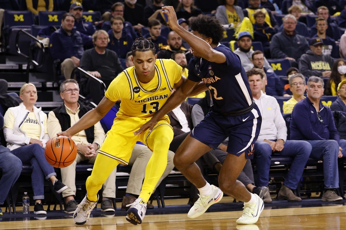 No. 3 Virginia use balanced attack to rally past Michigan CWEB