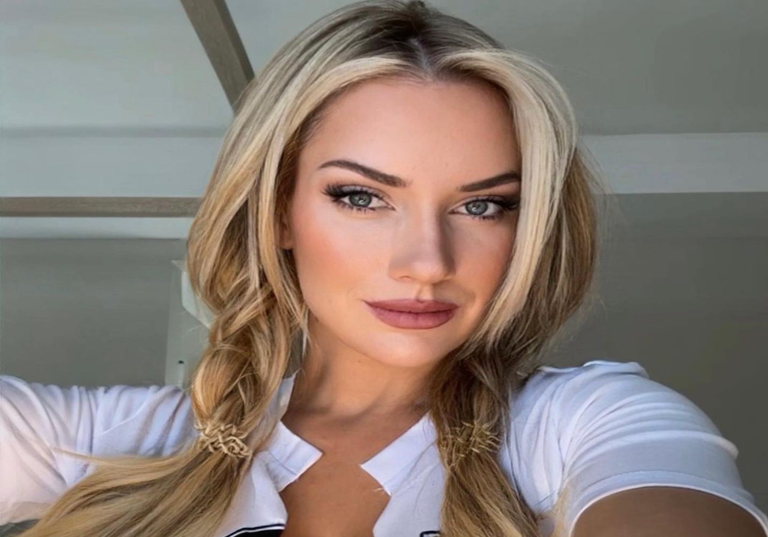 Celebrity Paige Spiranac Wishes Fans, Shares 2023 Sports Season Predictions, Promotes National Championship in White Bikini Top