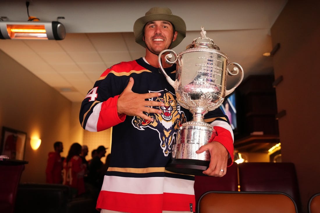 NHL News Feud over? Brooks Koepka wears Aaron Ekblad jersey CWEB