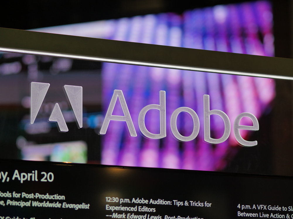 Adobe first quarter results beat estimate, shares fall 13 percent on weak revenue forecast